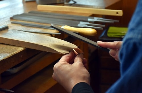The 'habaki' is being made by a craftsman at bizen osafune