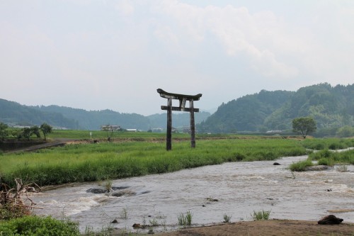 Stone Torii Behind Harajiri Fall in Oita prefecture, Kyushu, Japan.
