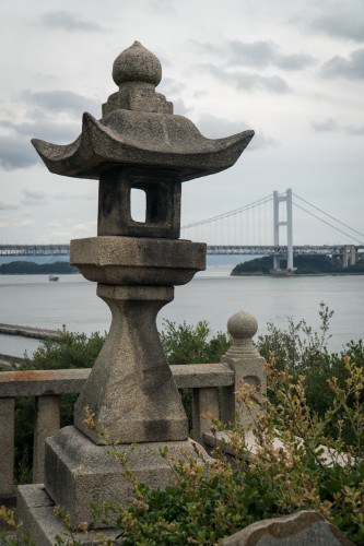 Kurashiki Shimotsui Gion Shrine and the Grand Seto Bridge in Okayama prefecture, Japan.