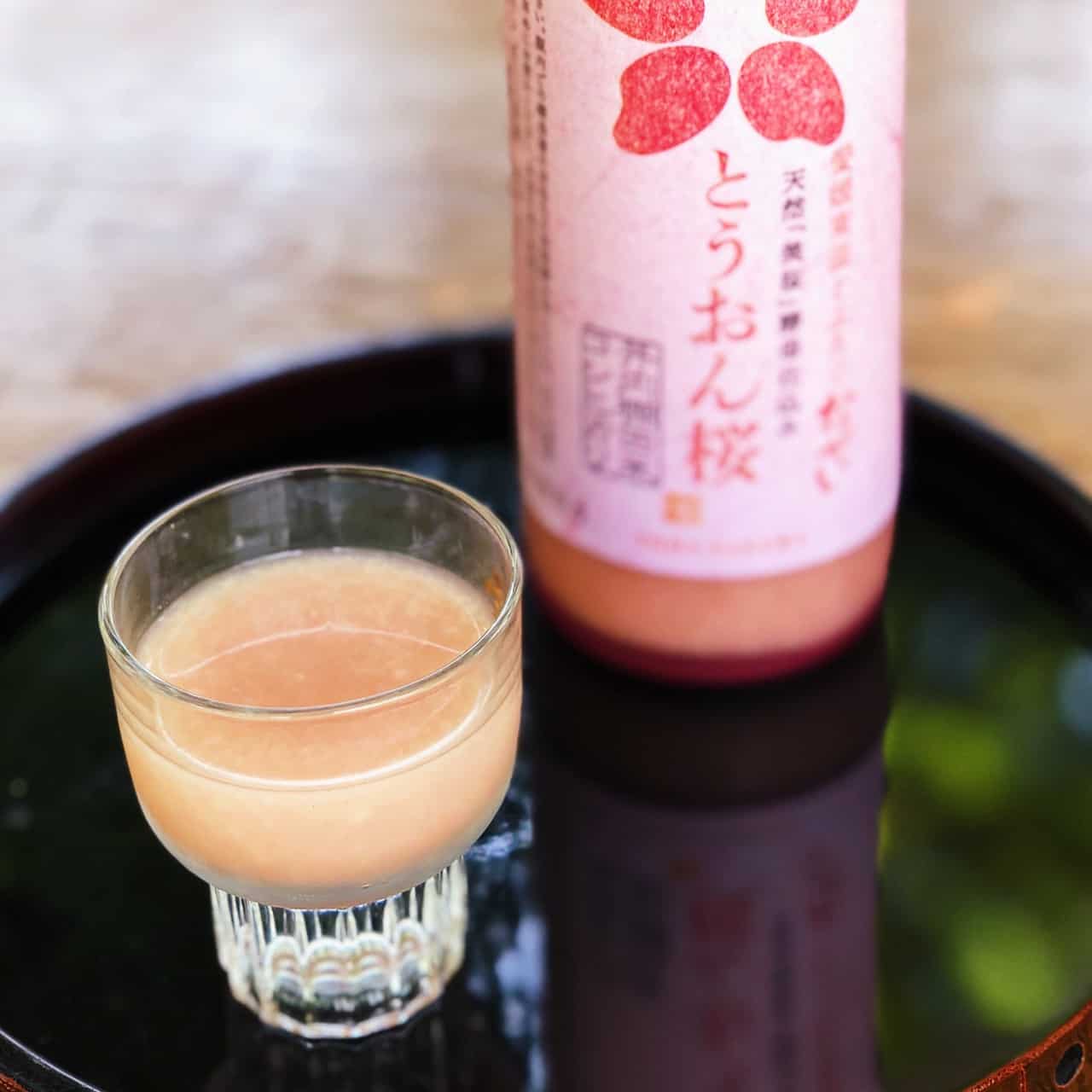A glass of rosé doburoku
