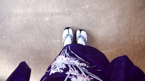 Wearing tabi socks and wooden geta.