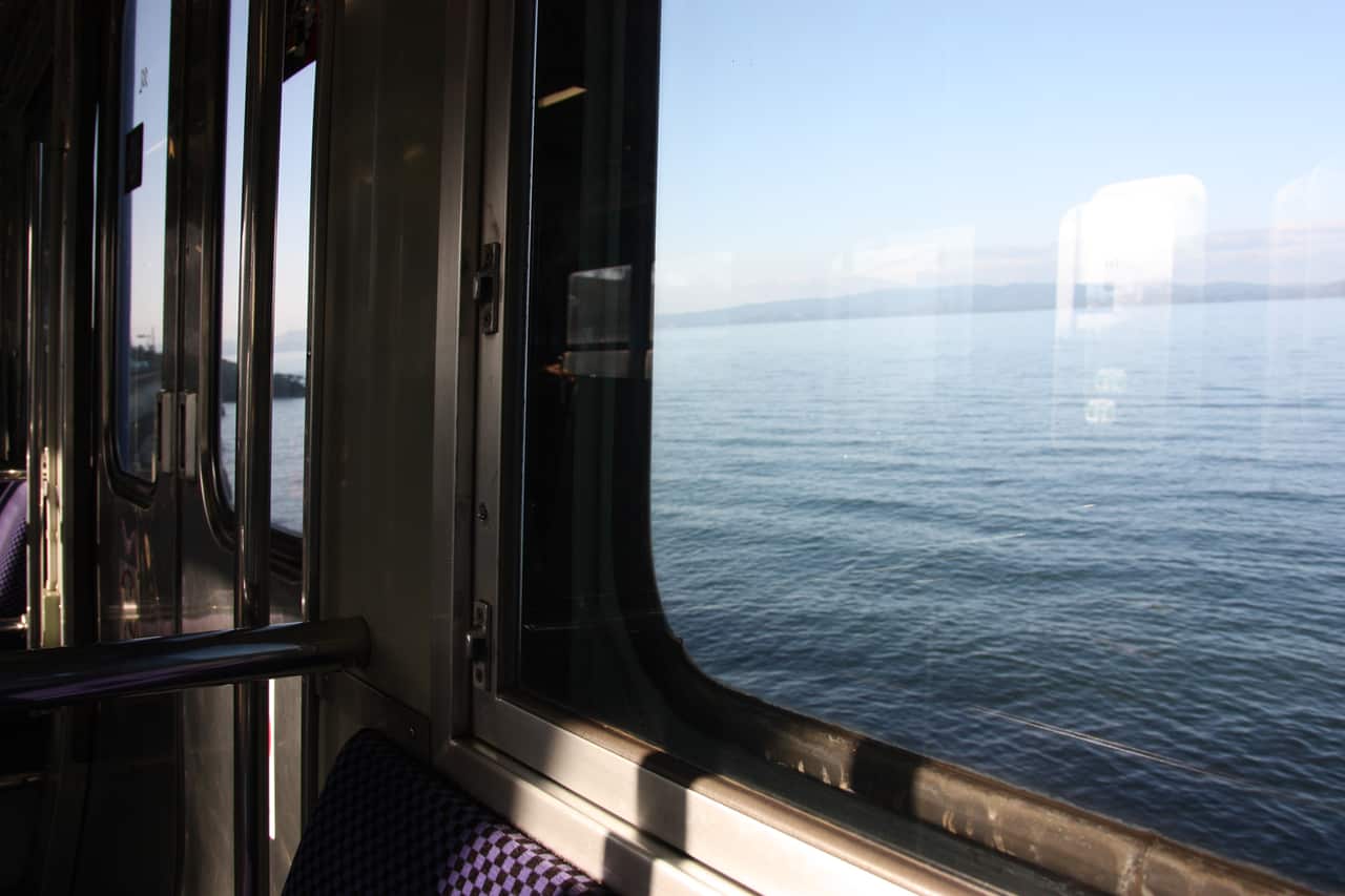 A view from inside the Seaside Liner along the Omura Bay, Nagasaki, Kyushu, Japan.