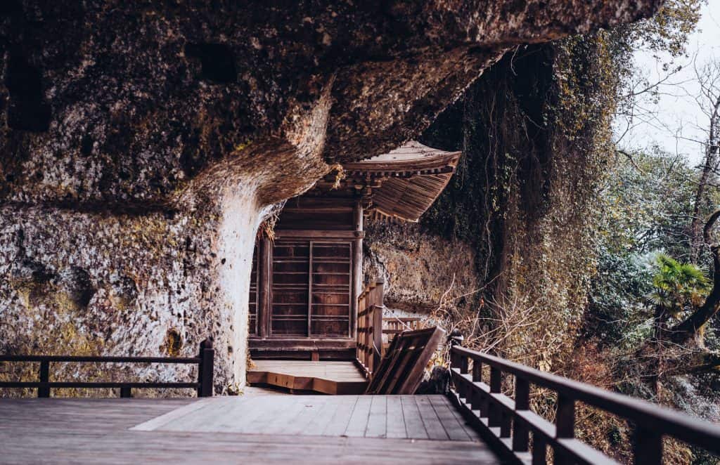 Japanese Buddhist temple in cliff in Japan
