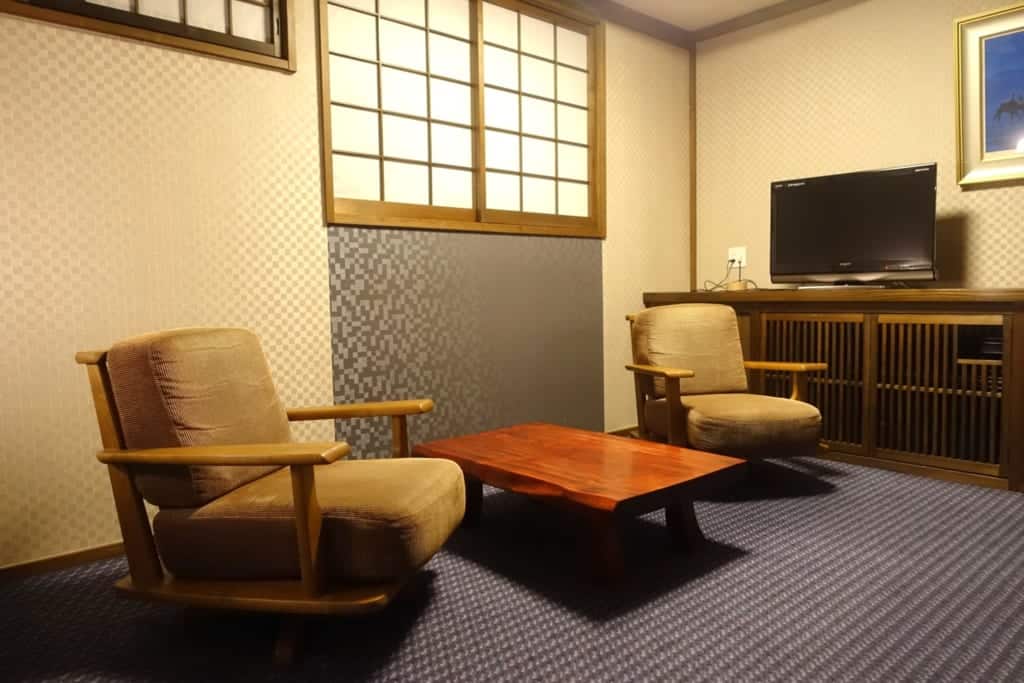 Reading corner of a room at the ryokan Yunoyado Motoyu club in Yuzawa, Japan