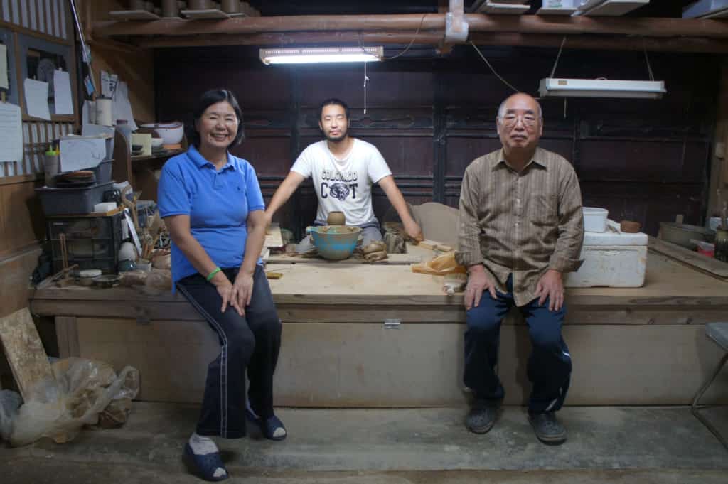 Yamaguchi family: parents and son, in their Shodai Yaki pottery workshop