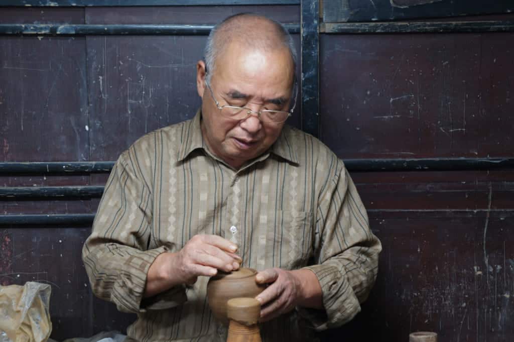 Mr Yamaguchi, working in his workshop
