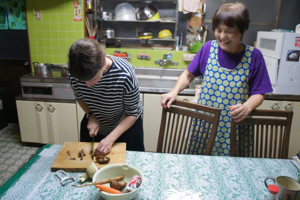 Mrs Yonemura teaching Clementine local receipts in her kitchen