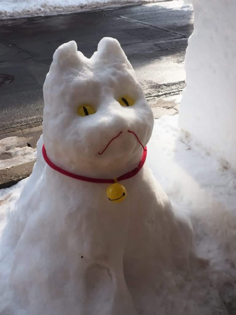 Dog carving in the snow during the Inukko Matsuri festival