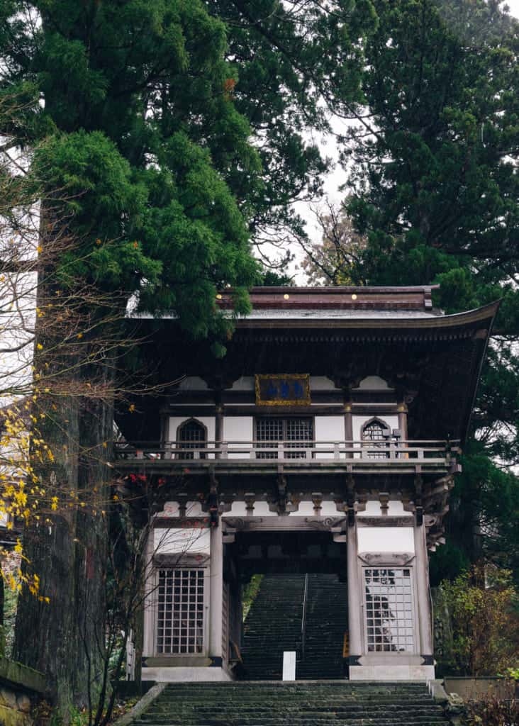 Traditional Japanese gate leading to religious site in Japan