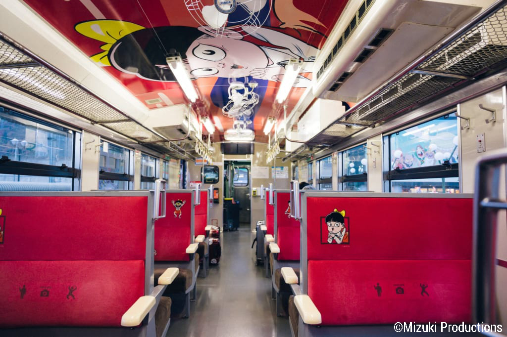 Interior of Nekomusume train on the Kitaro Line from Sakaiminato