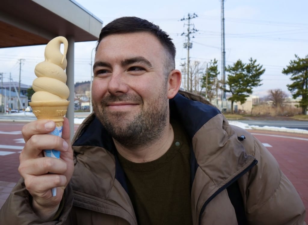 Eating fish sauce soft serve ice cream in Oga