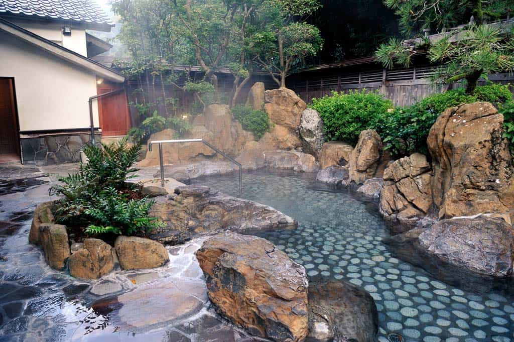 outdoor rotenburo bath at one of 7 public onsen hot springs in Kinosaki Onsen, Japan