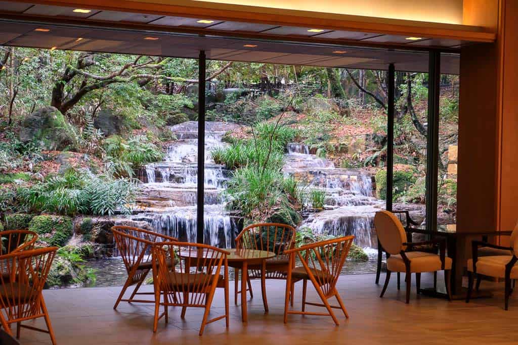 waterfall view from Japanese luxury hotel window in Japan
