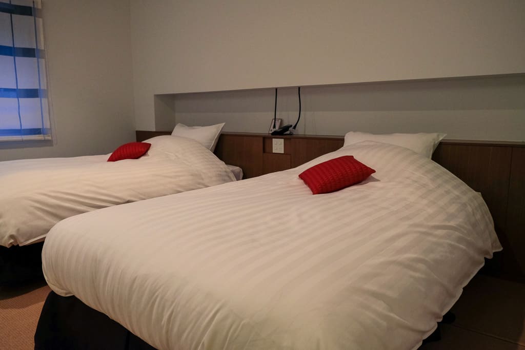 western style beds at Nishimuraya Hotel Shogetsutei, kinosaki onsen, Japan