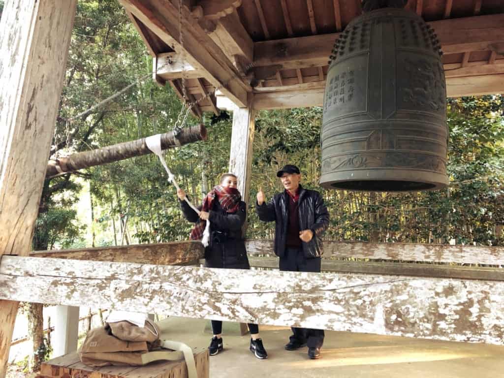 Ringing a bell in Izumi, Kagoshima, Japan