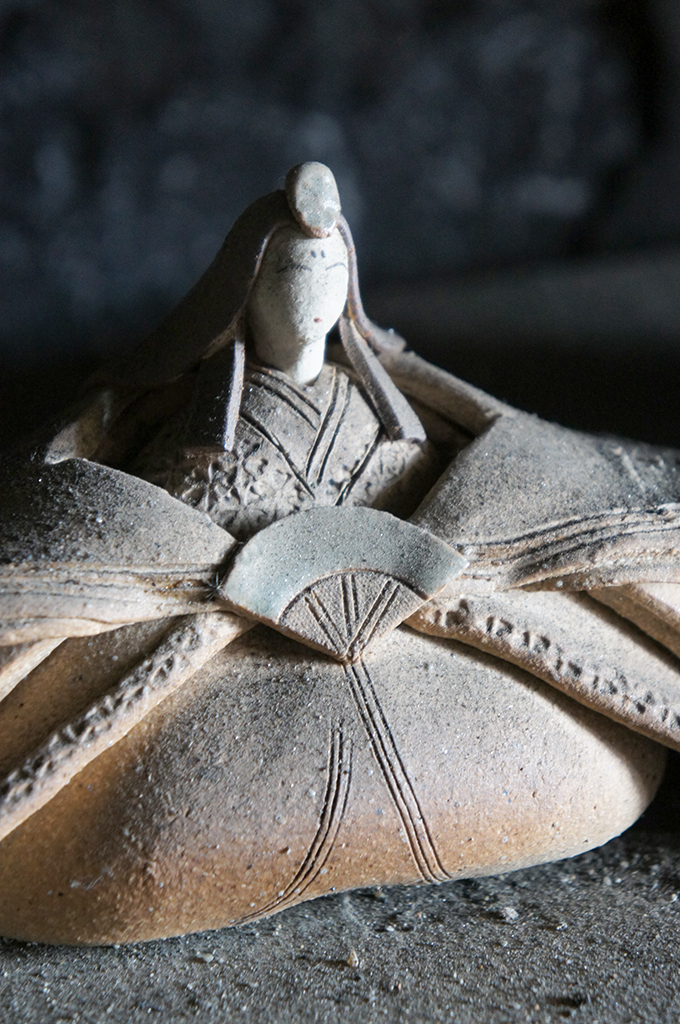 Clay figurine resembling a doll