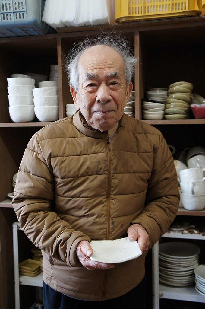 Resident holding a ceramic plate