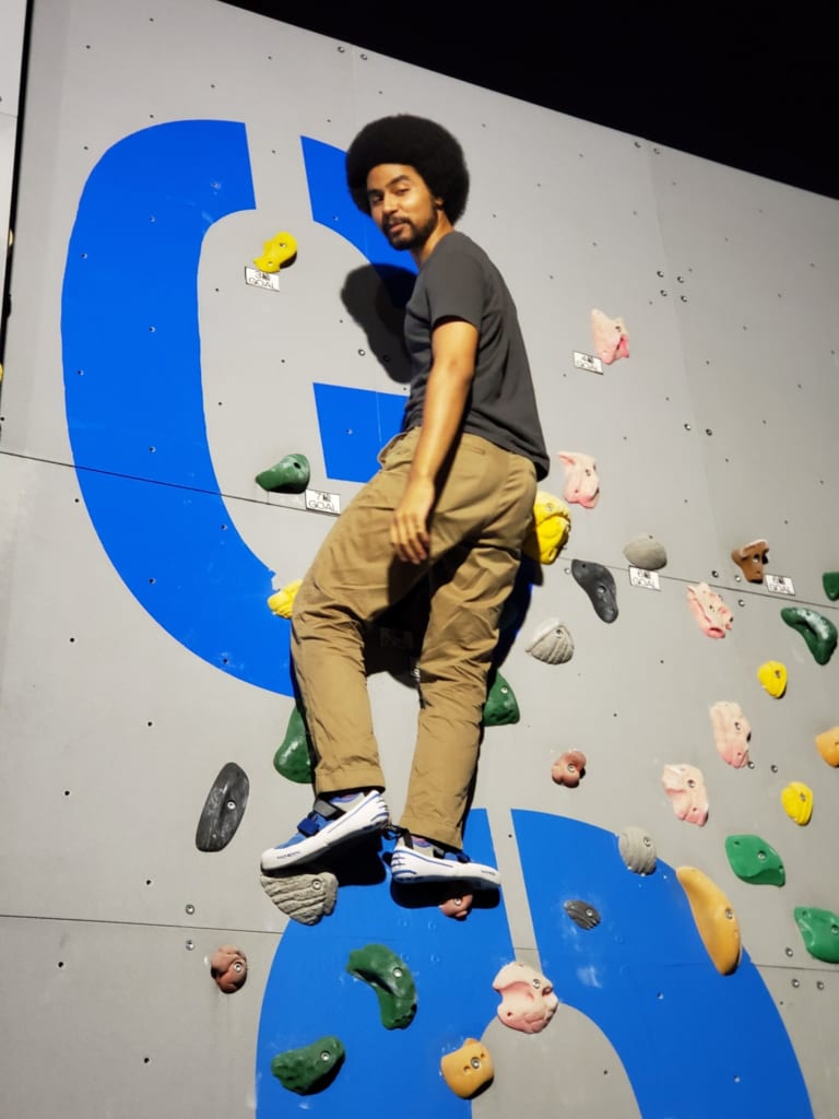 Using the climbing wall at Sporu