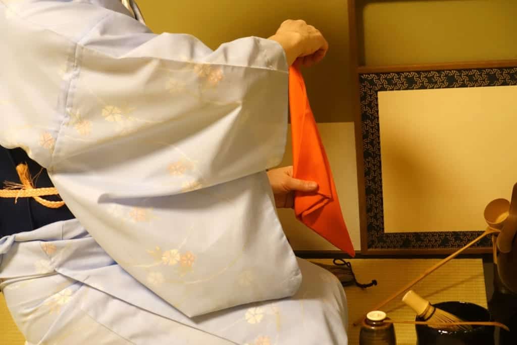 Folding the fukusa used for Japanese tea ceremony