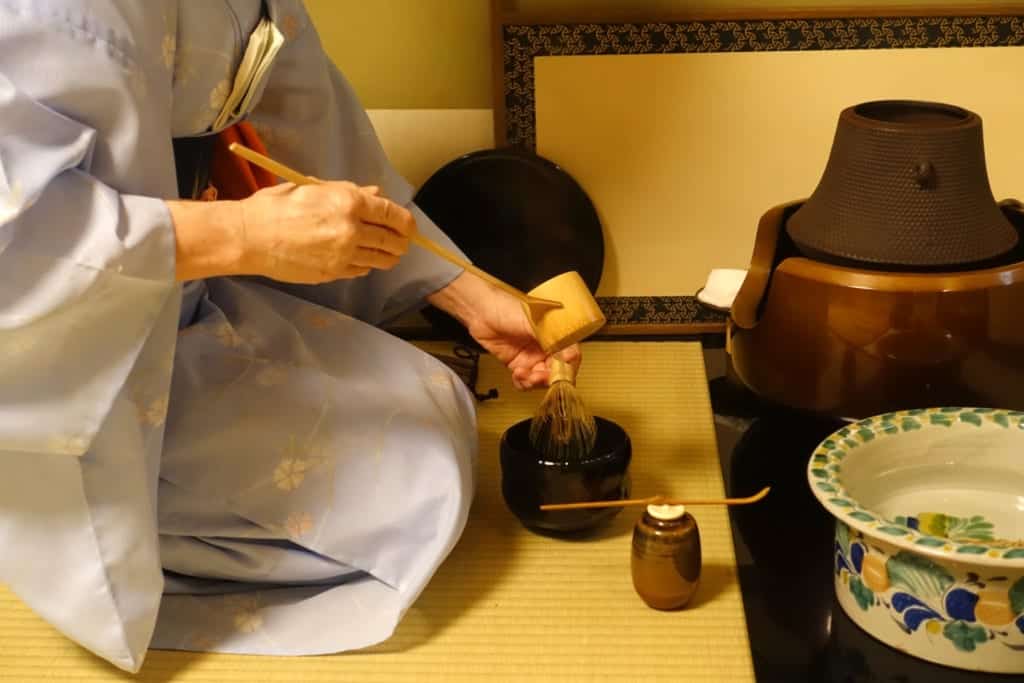 One of the meticulous steps to prepare the tea during a traditional Japanese tea ceremony