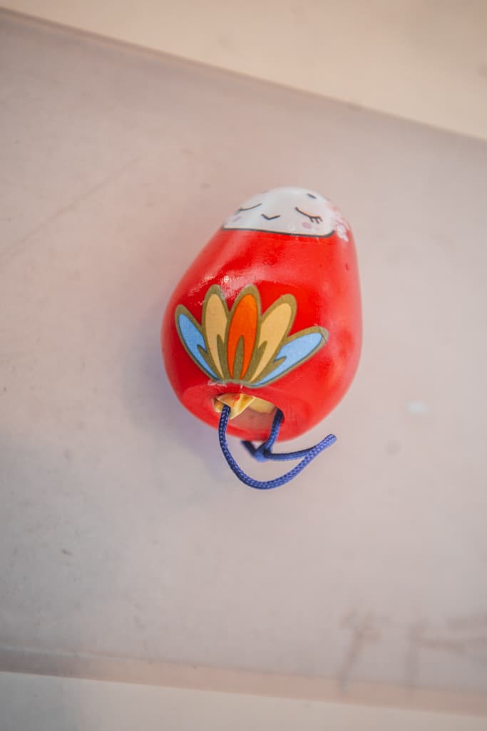 Omikuji inside the doll. Himejima shrine, Osaka