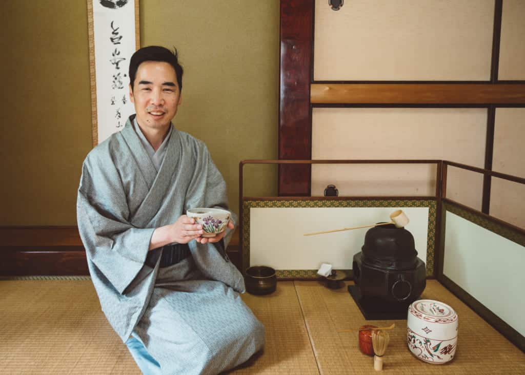 man practicing Japanese tea ceremony