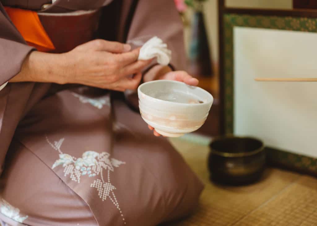 purifying the tea bowl for tea ceremony