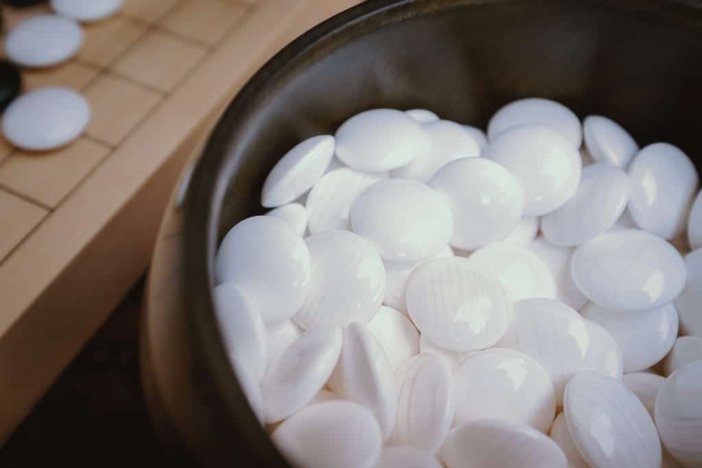 white go stones made out of shell