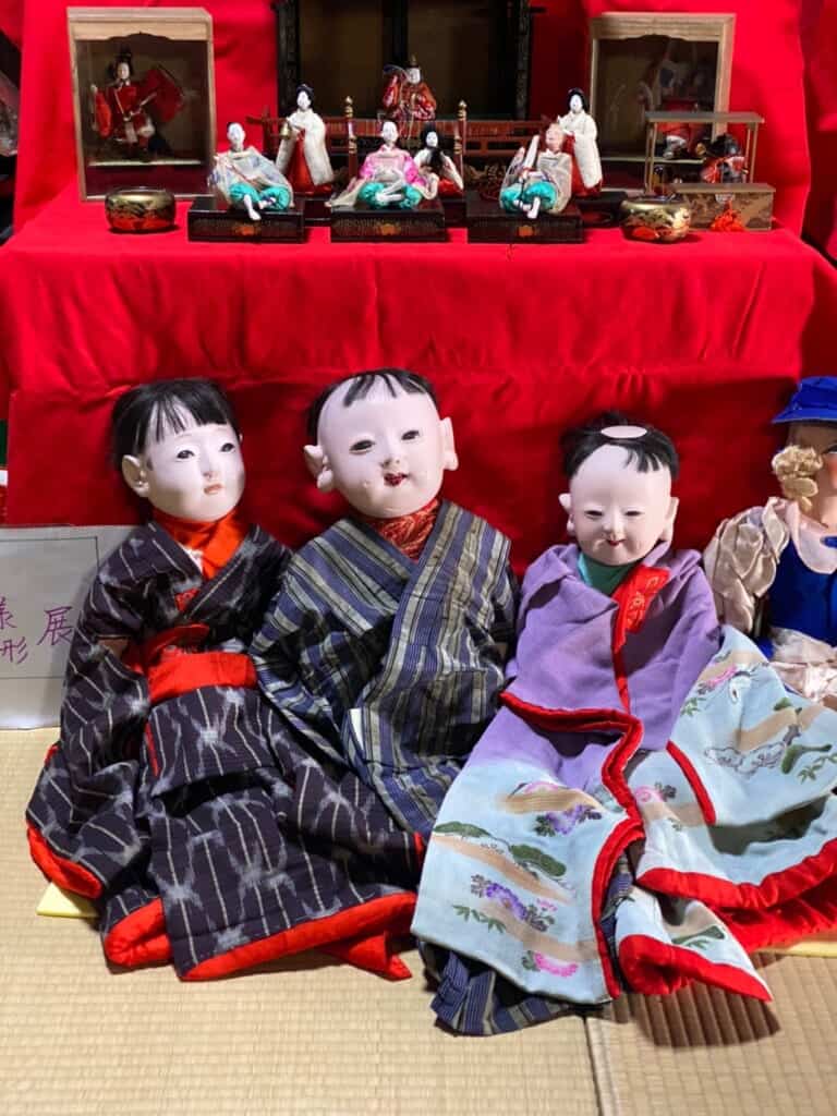 Closeup of the rare Tenjin dolls made out of Paulownia wood and lacquer powder, made by Minoru Aono, in a Traditional Japanese house on the Tokaido Road