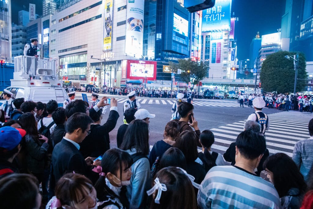 Police controlling the crowds in Shibuya