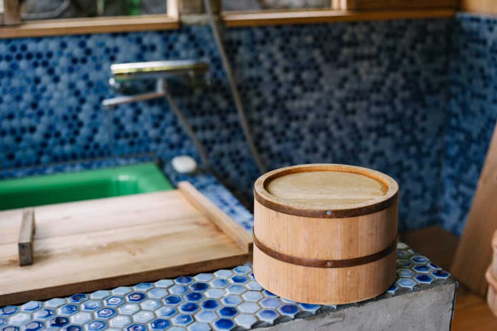 Wooden bucket used for washing in a Japanese bath at Yanoya guesthouse on Ojika Island