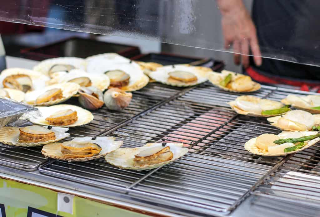 Scallops being grilled at Otatomari Swamp on Rishiri Island, Hokkaido
