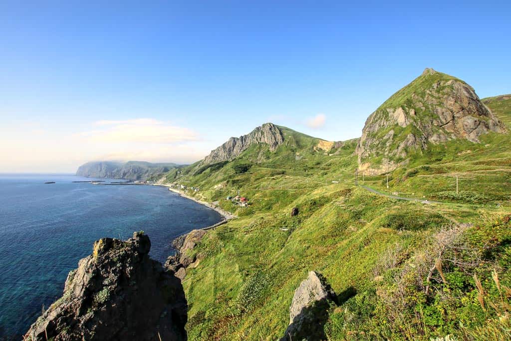 Ocean and hillside views along Momoiwa Observatory Point while hiking in Rebun, Hokkaido