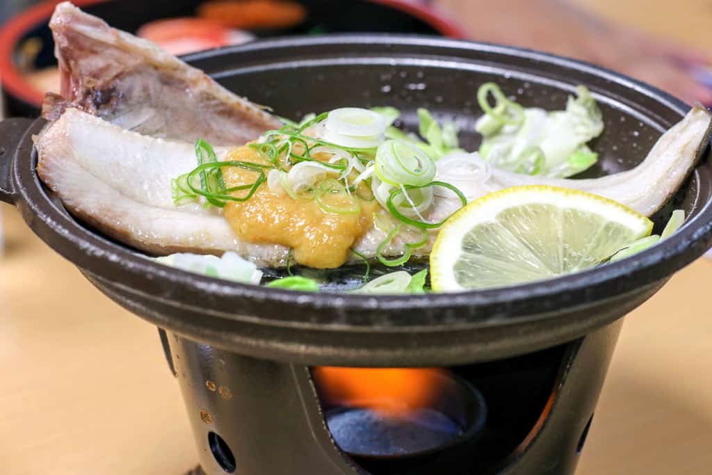 Sizzling dishes of miso-coated hoke (local mackerel) in Hokkaido