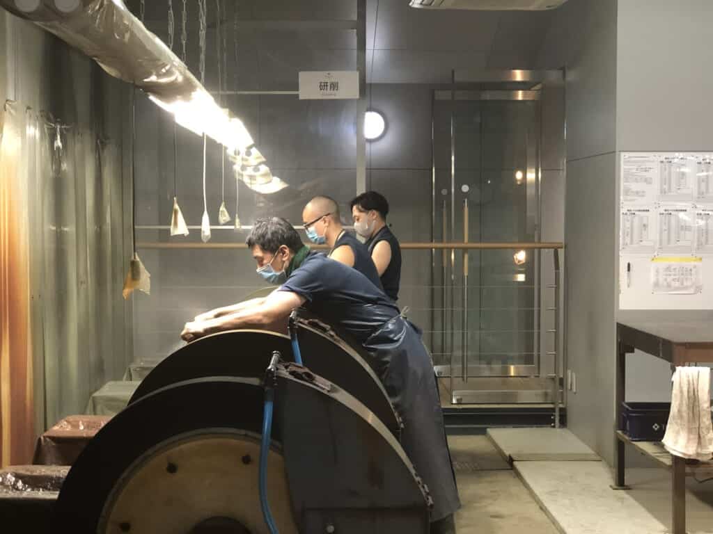 Workers inside a knife factory in Japan