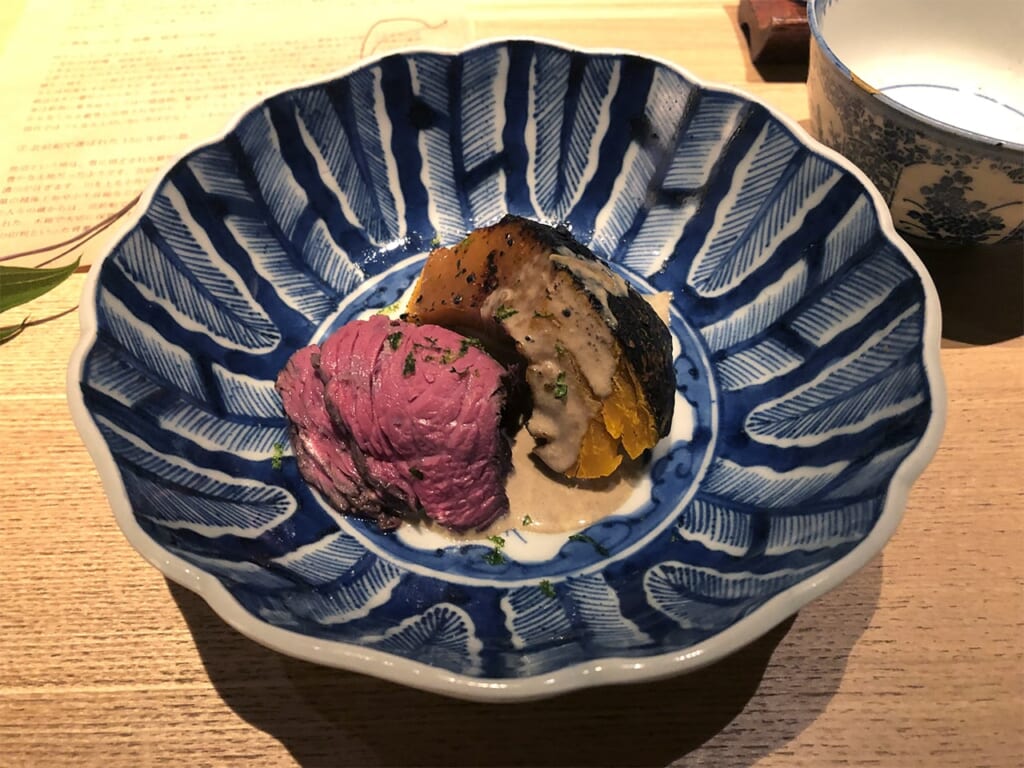 Meat dish in a Japanese plate