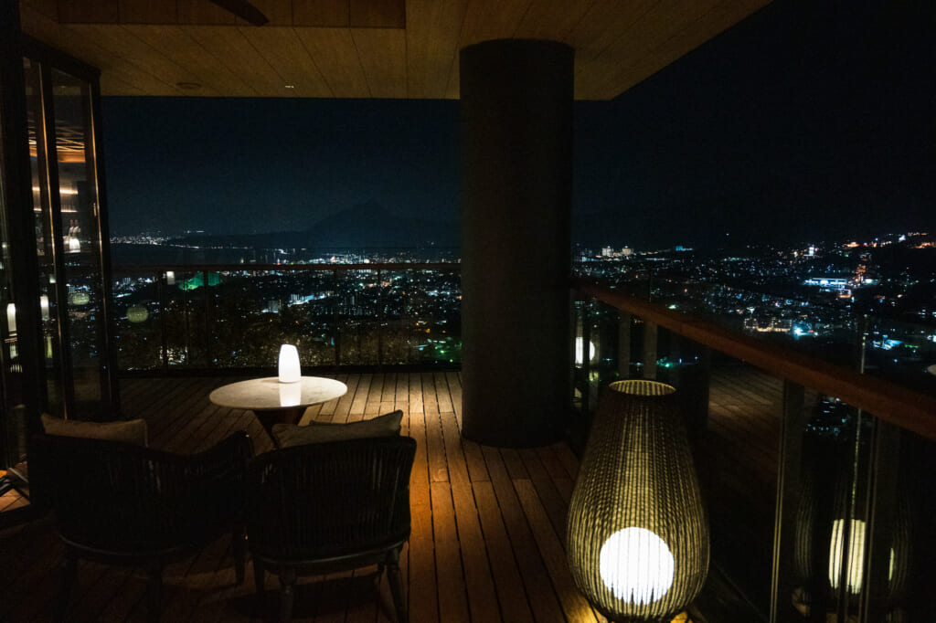 night time view of beppu overlooking balcony
