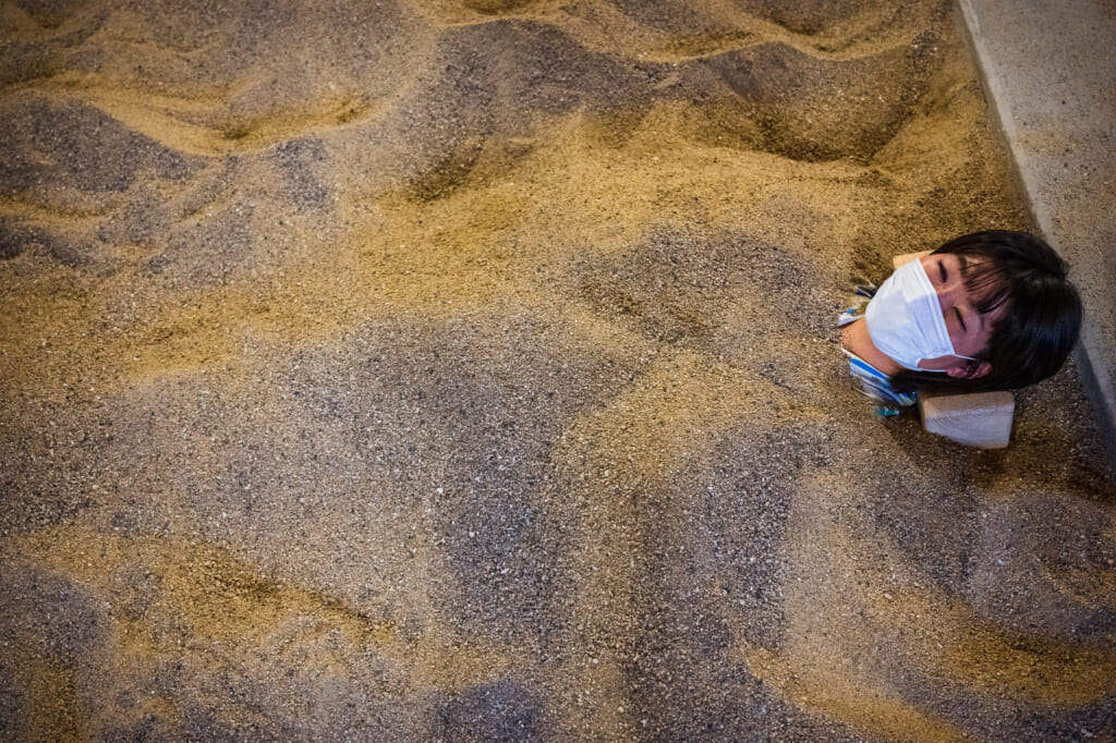 woman in beppu sand bath