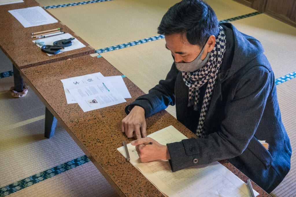 tracing sutra in japanese temple of goto islands