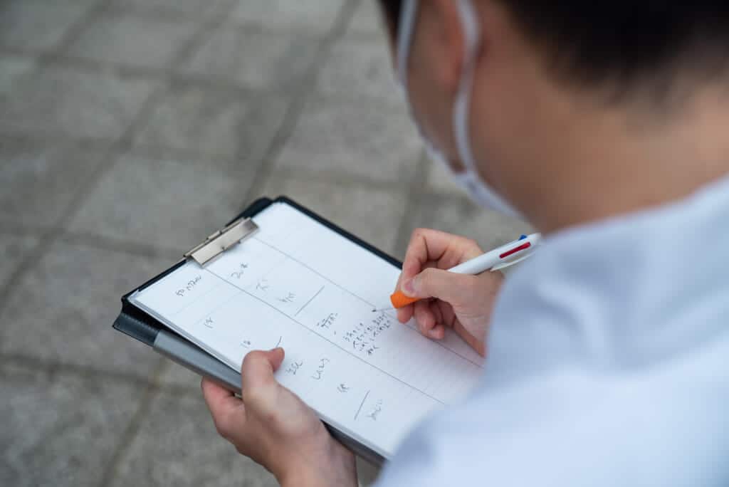 monk writing at Usa jingu