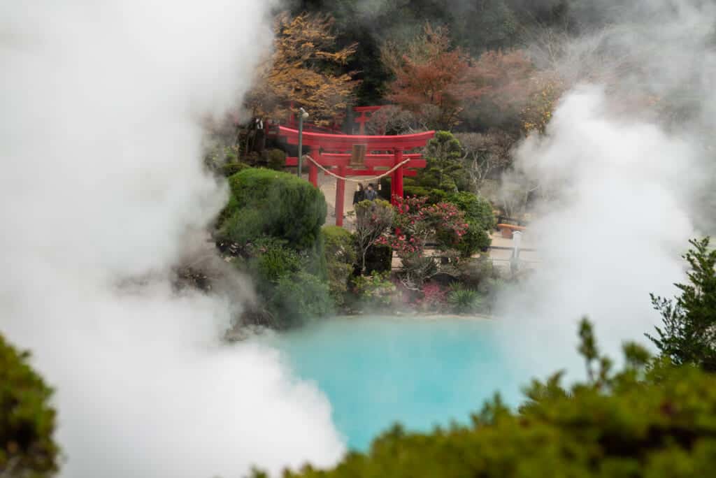torii gate and hot spring steam at Beppu's "Seven Hells of Beppu" in Oita Prefecture