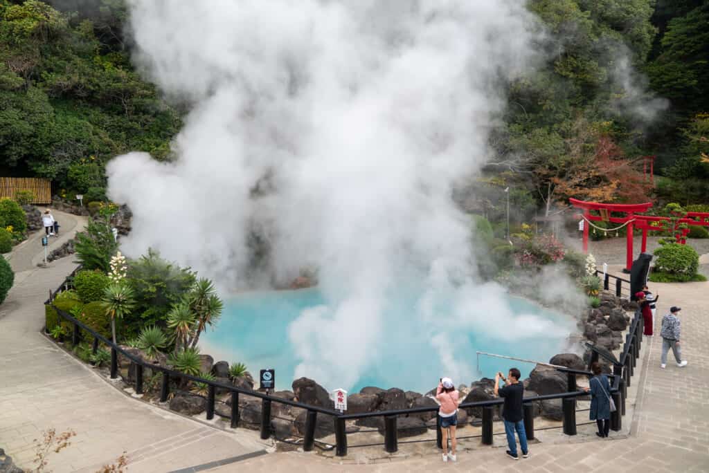turquoise blue waters and rising steam at One of "Seven Hells of Beppu" in Oita Prefecture