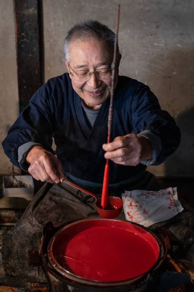red wax in making of traditional japanese candles in Gifu, Japan