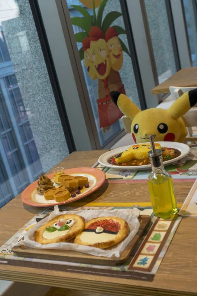 Pikachu enjoys a curry at the Pokemon cafe in Tokyo.
