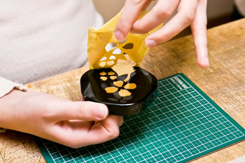 pulling off gold leaf