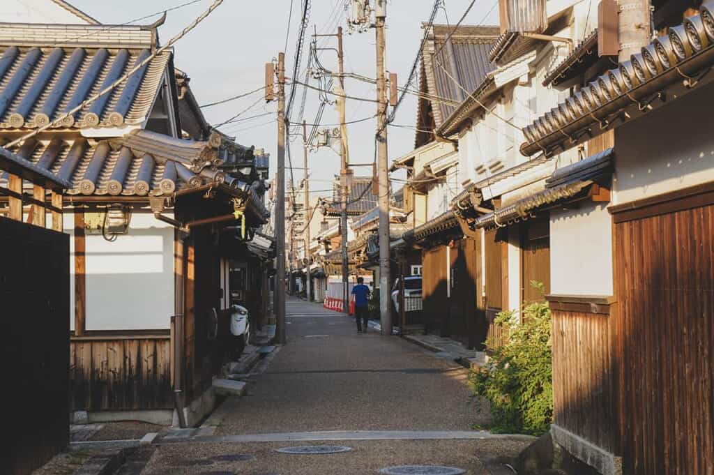 Narrow alley between traditional Japanese houses in Imaicho, Kashihara, Nara