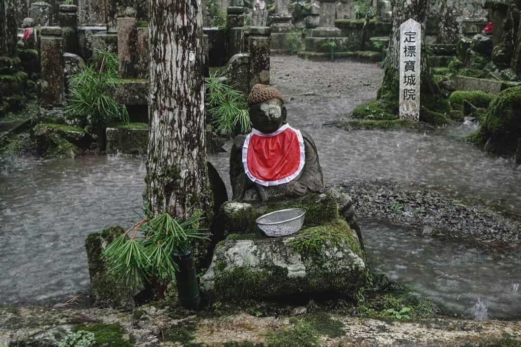Jizo statue in the rain