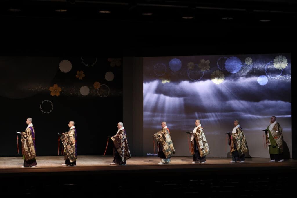 Japanese Buddhist monks chanting on stage