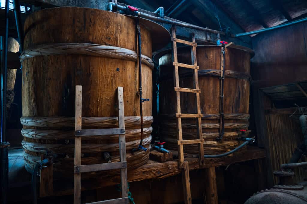 Japanese wooden vats for making soy sauce at meijiya shoyu