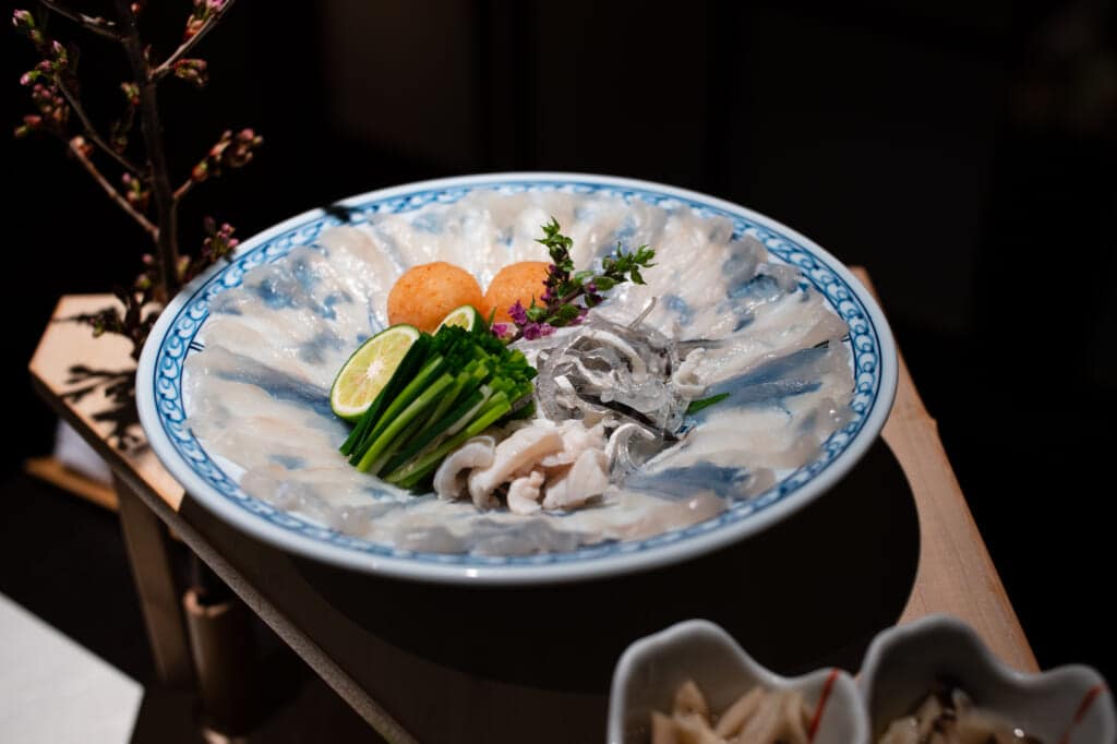traditional Japanese delicacy, fugu blowfish sashimi at hoshino resorts kai enshu